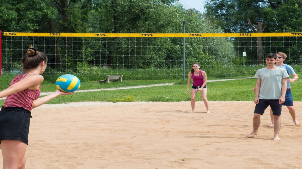 tum-school-of-management-campus-volleyball-field-with-students